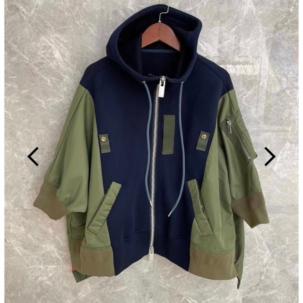 Sacai zippered hoodie/modern take on bomber jacket.Short sleeve. Barely worn